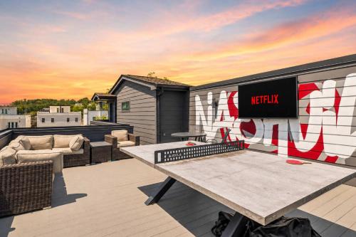 Haynes Area House | Stylish Multi-Level Retreat Rooftop & Pool Table
