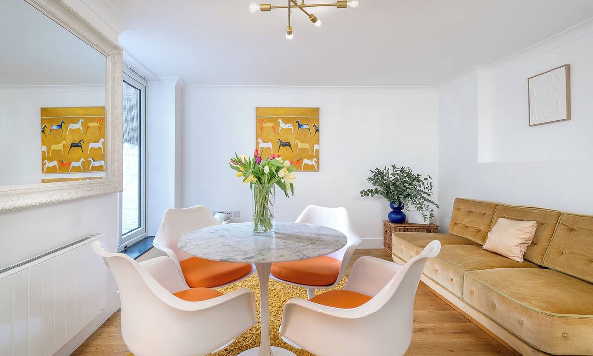 Harrow Road Apartment | Stylish newly renovated 2BR garden apartment in the heart of Maida Vale, featuring a bright open-plan living space, private courtyard terrace, fast WiFi, and excellent transport links. Just a short walk to multiple tube stations.