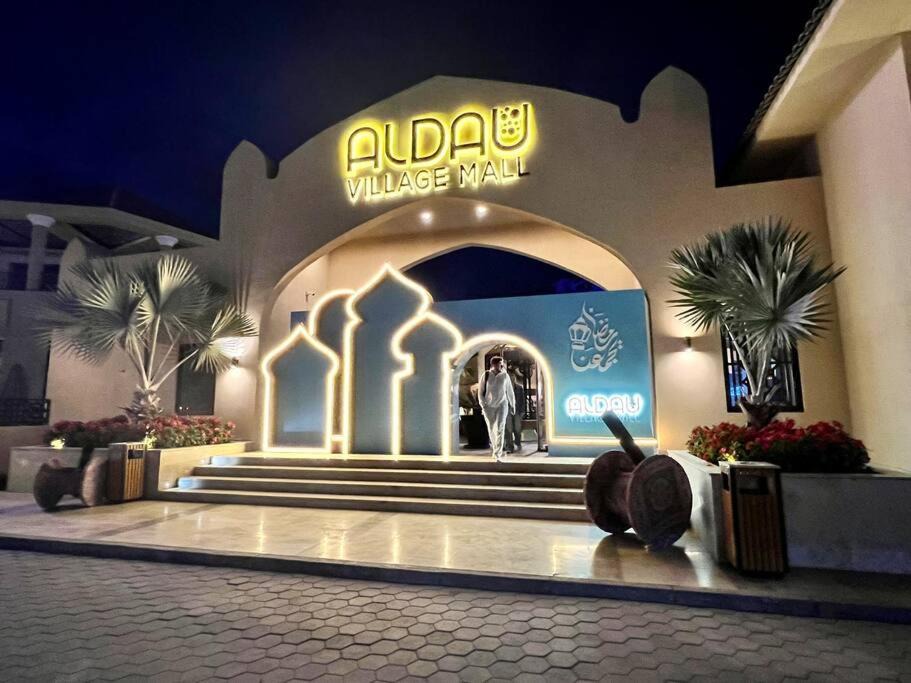 Village Road Apartment | Stylish pool view Studio in Al Dau Height’s