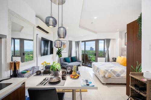 Maribago Apartment | Stylish Studio at Tambuli Residences Ocean View by Dominik Studio Apartment with Pool Access & Balcony in Mactan