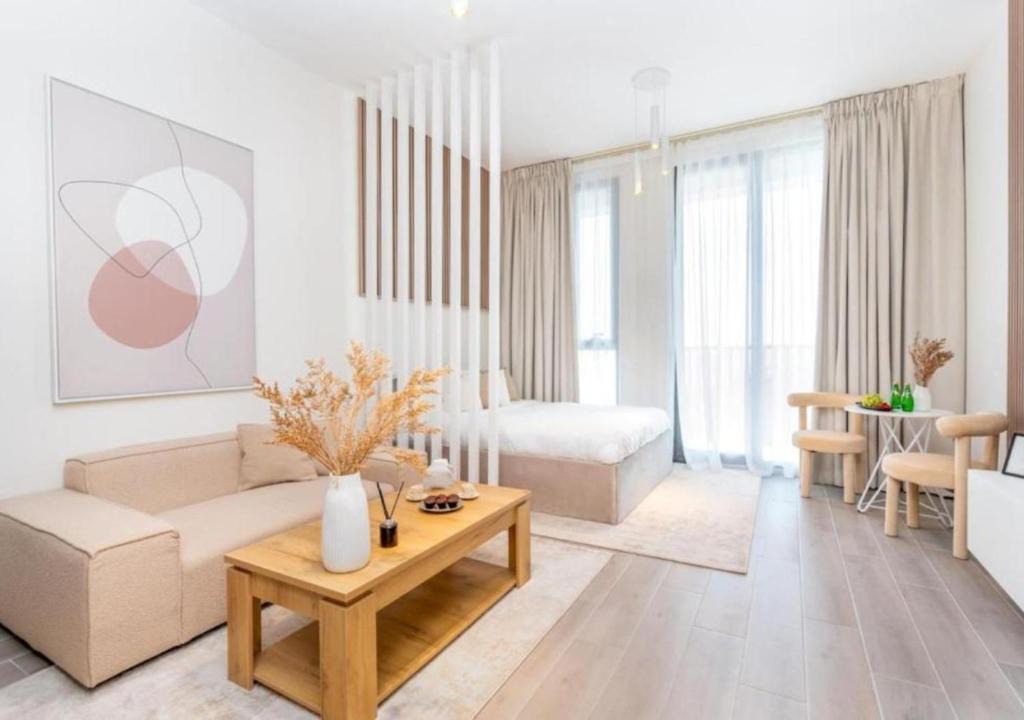 Dubai Production City Apartment | Stylish Studio Midtown 20 mins to Expo City by Vibel