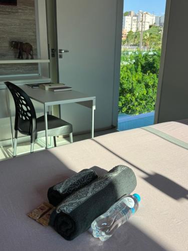 Capoeiras House | Suíte Grande com AR, TV e sacada em Florianópolis