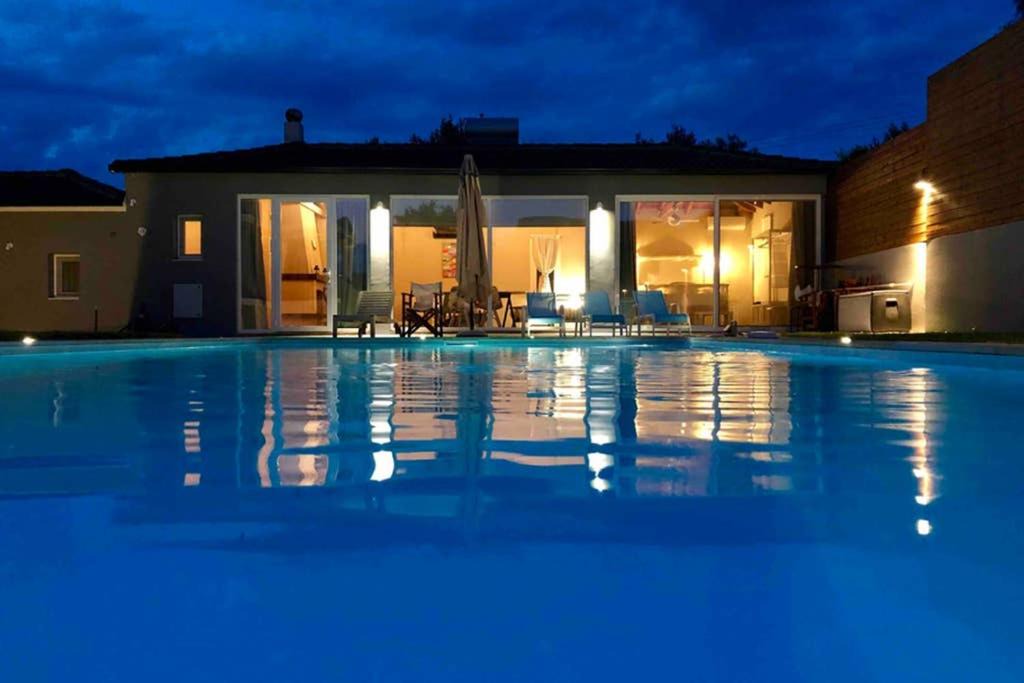 Korithion House | Sunlit Pool House