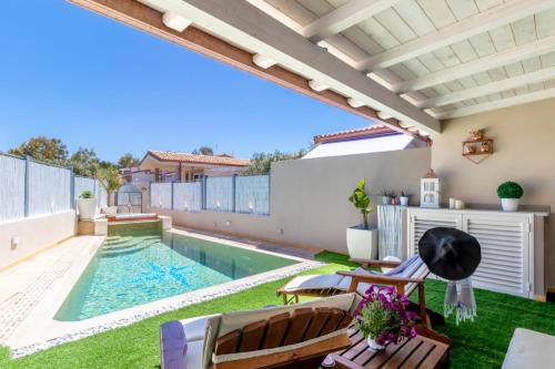 Valledoria Villa | SUNSET BAY POOL VILLA SARDINIA with private heated pool, jacuzzi, counter-current swimming