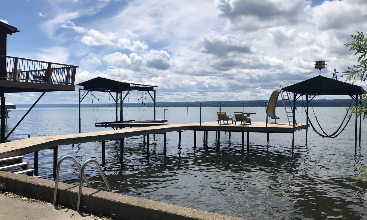 Town of Ledyard Cottage | Sunset Haven, lakefront on Cayuga Lake w/ Hot Tub, Waterslide & Boat Lift