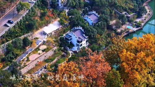 Xiling Qu Hotel | Taofanting Riverside Hotel