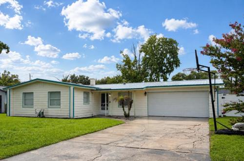Goldenrod House | The Canopy on Periwinkle- A Home Away From Home