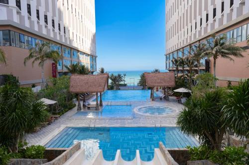 Suoi Nuoc Beach Hotel | The Seafront Condotel - Apec Mandala