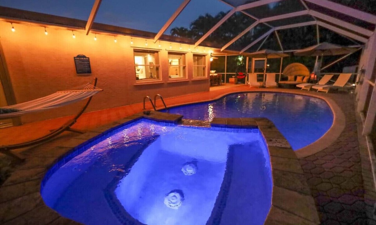 Greenacres Villa | The Utopia Resort Heated Pool Spa Waterfall BBQ Studio and more Hosted by Relaxtay