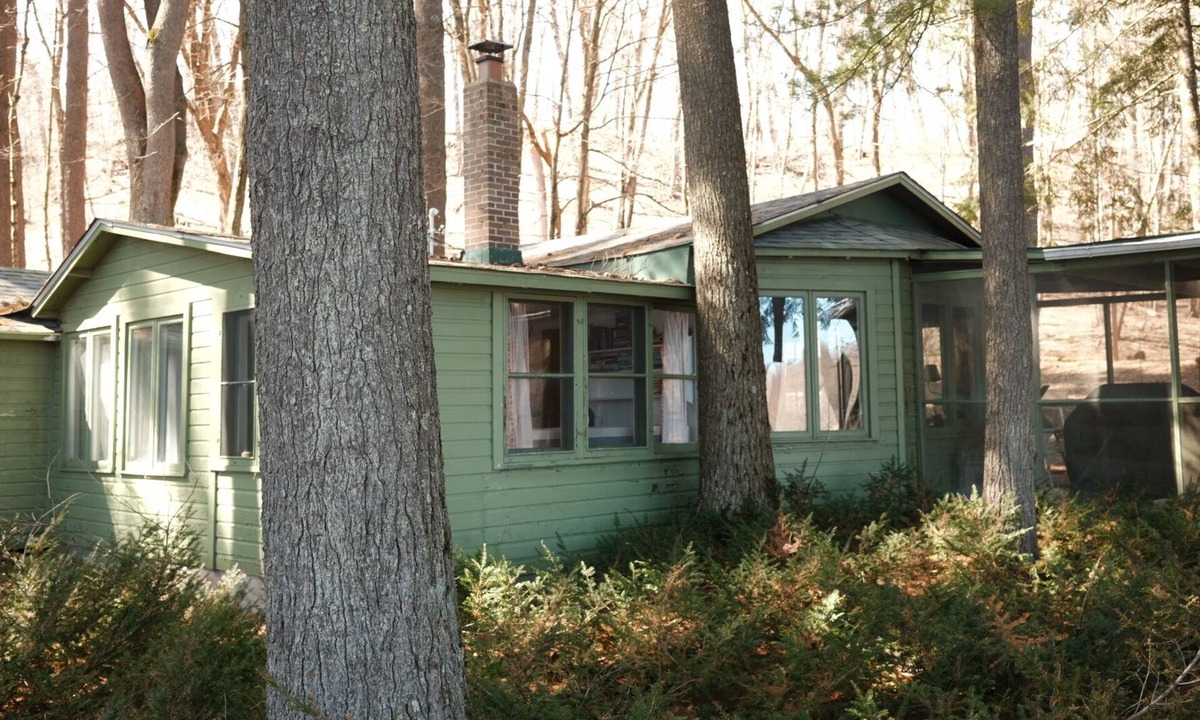 Scandia House | This 1920's river cabin is full of vintage charm. Nestled in a grove of white pines on the banks of the scenic saint croix river, this three bedroom, one bath cabin offers a space designed for rest and simplicity.