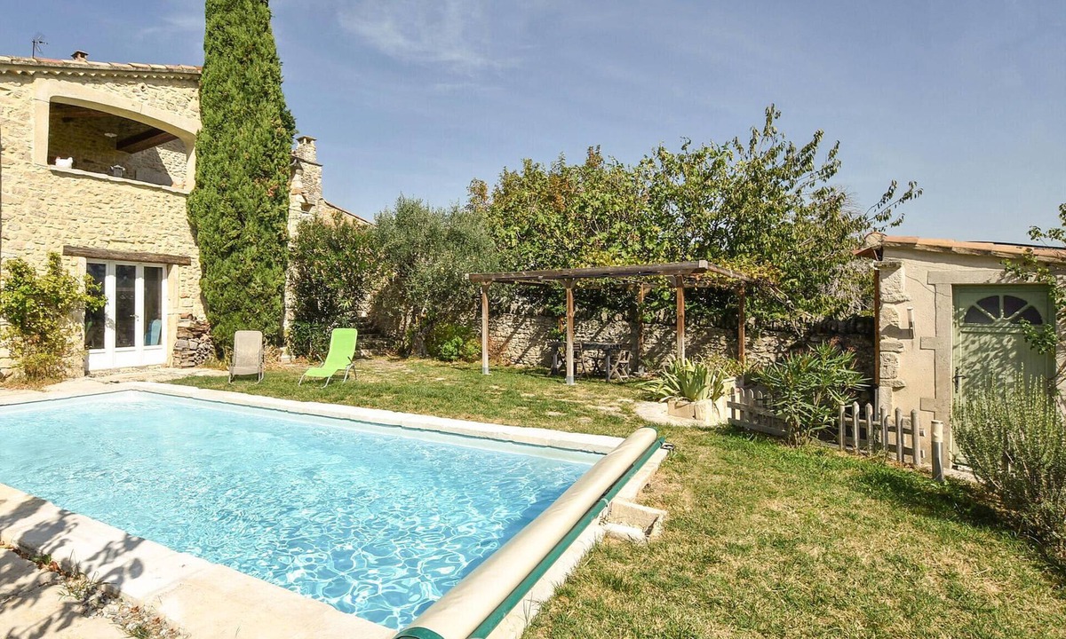 Taulignan House | This beautiful and spacious stone vacation home welcomes you on a large and wooded property.