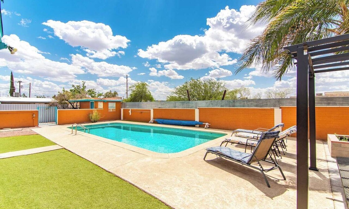 Midtown Apartment | This centrally located 1 bedroom features a full size pool and electric vehicle charging on site.
