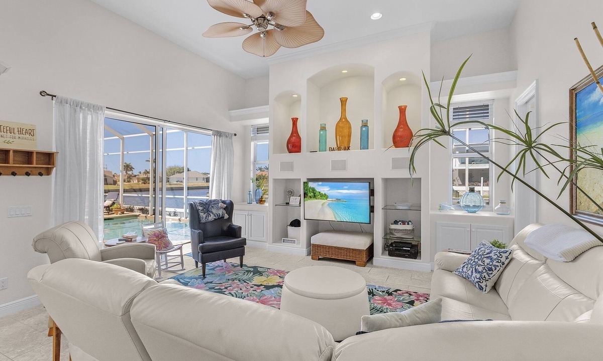 Pelican Villa | This Villa has it all! Waterfront - heated pool, hot tub, boat dock, tiki hut!