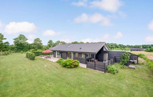Krejbjerg House | Three-Bedroom Holiday Home With A Fireplace In Ejstrupholm