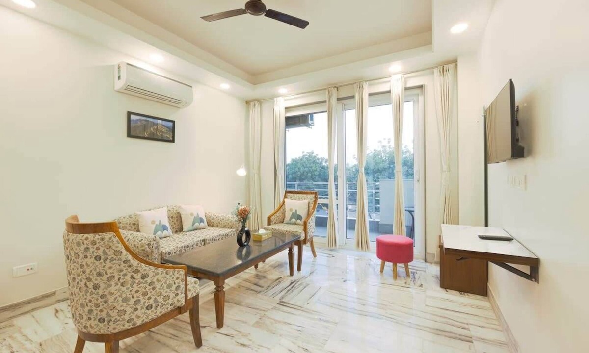 Sushant Lok Apartment | Tranquil 2BR Oasis with Balcony & Bathtub