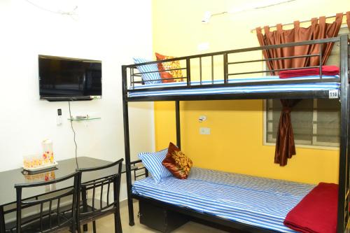 Bhubaneshwar House | Tranquil AC Budget Room(Single, Family & Group)