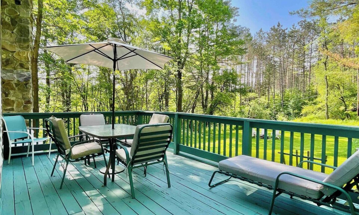 Oneonta House | Tranquil cottage retreat with screened porch, campfire, and cozy living spaces. Perfectly located near Cooperstown and Oneonta. Sleeps 6.