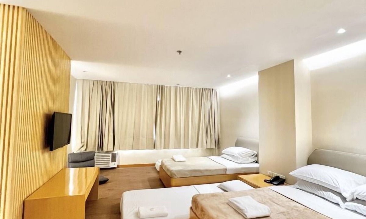 Downtown Tacloban Apartment | Tranquil Retreats: Explore the Charm of Etsu Hotel's Studio