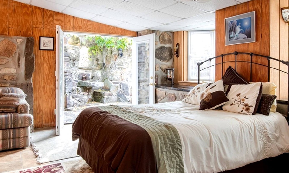 Omaha Cottage | Tranquil Stone Cottage Behind Castle Walls in the Ozarks