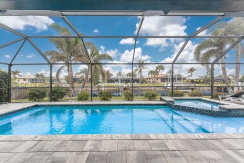 Punta Gorda House | Tranquility Waterfront Villa Pool Dock