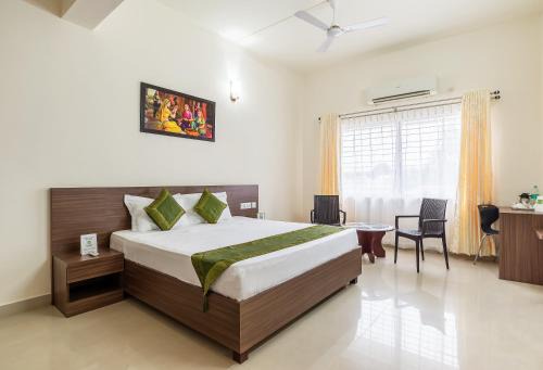 Adyar Hotel | Treebo Pappilon Palace - PVS Circle