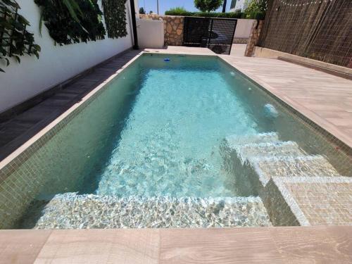 Santiago de la Ribera House | Triplex con piscina en S. Javier