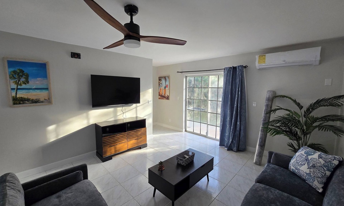 Bahamas Terrace Apartment | Tropical Poolside Getaway in Freeport