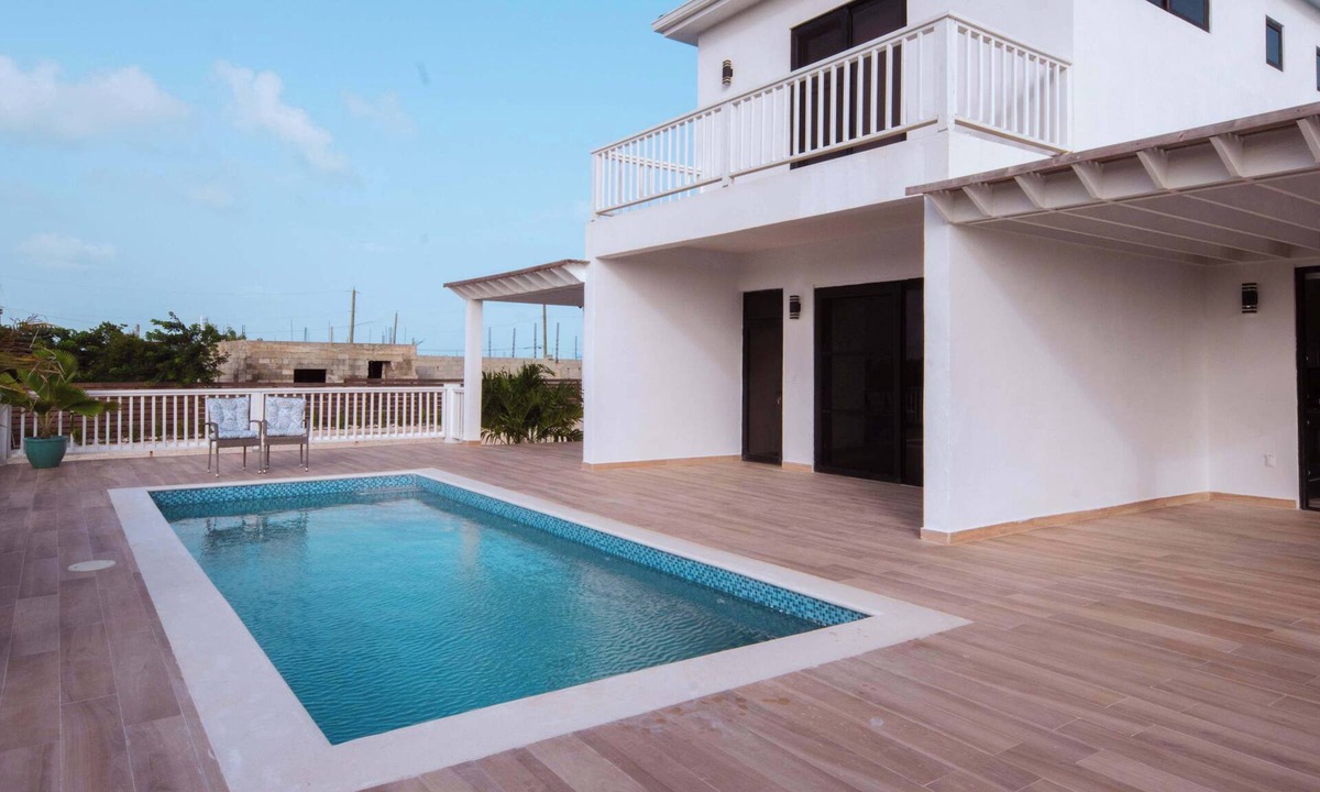Leeward Settlement Apartment | Tropical Stay Near Beach w/Pool Access & Parking