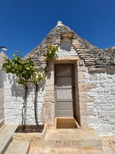 The Trulli of Alberobello Apartment | Trullo Soave Suite - outdoor jacuzzi