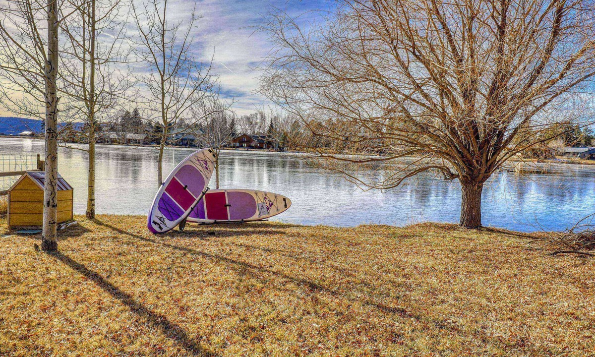 Pagosa Springs House | Tubing Promo! Lakefront, Fireplace, Large Deck, Yard & Dock. Mins from Uptown Dining & Trails!