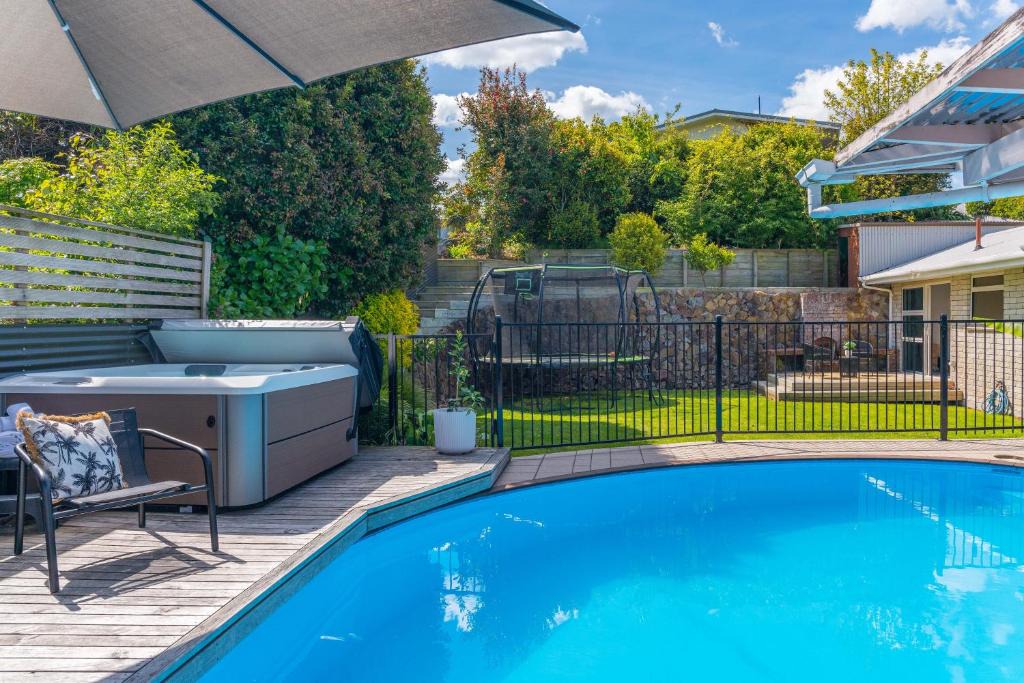 Hilltop House | Tuis and Pools - Lake Taupo Holiday Home