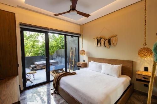 Playa Paraiso Apartment | Tulum Escape - Jacuzzi - Free bikes & Beach