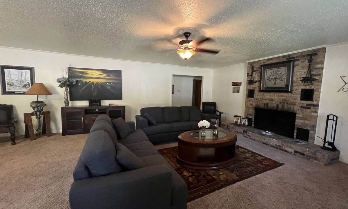 Mount Ida House | Two bedroom House with fenced in yard, covered patio area, located at the Joplin Inn at the entrance to Mountain Harbor, just 1 1/2 miles from Lake Ouachita. by RedAwning
