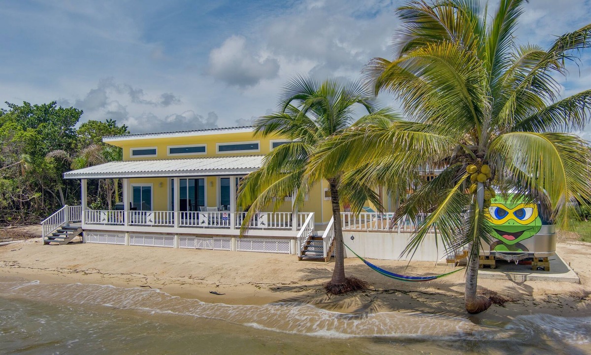 Plantation House | Ultimate Luxury Beachfront Rental with Pool