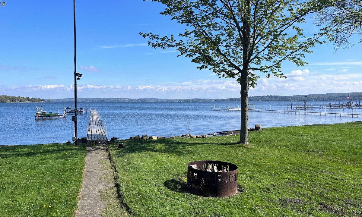 Bemus Point House | Unique Lakefront Property with dock slip and trampoline for the kids.