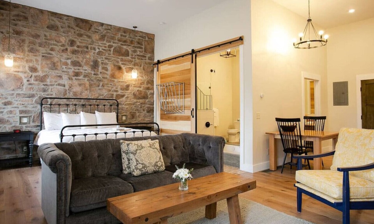 Millersburg Apartment | Unique Rustic Suite with Jacuzzi Tub, Kitchen, Fireplace, and Living Room