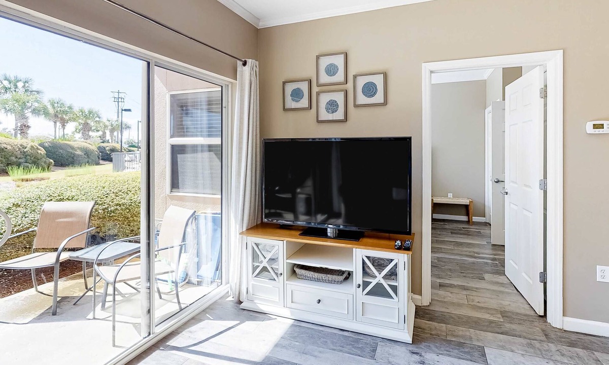 Frangista Beach Condo | Updated ground floor beachside condo with private beach access & patio