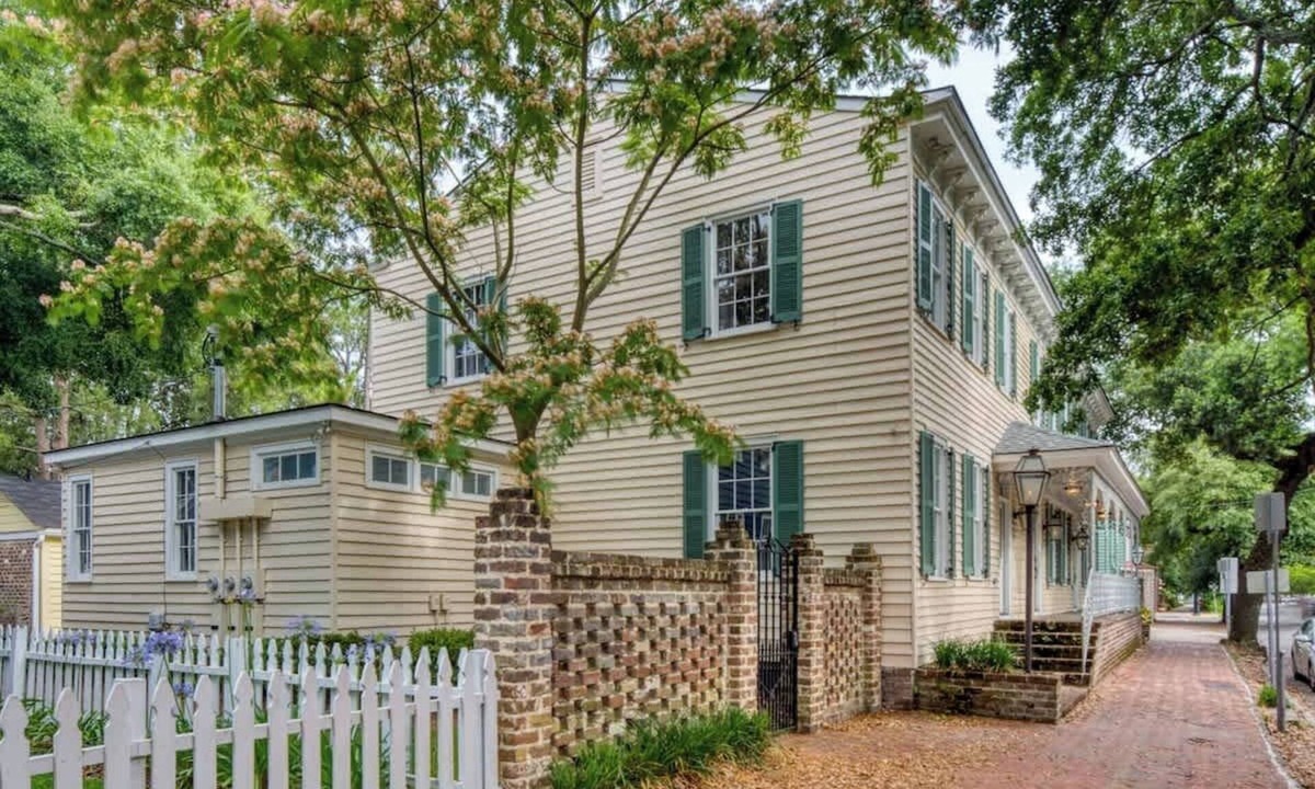 Hitch Village - Fred Wessels Homes Condo | Updated Historic Villa with Parking & Walk to River St.