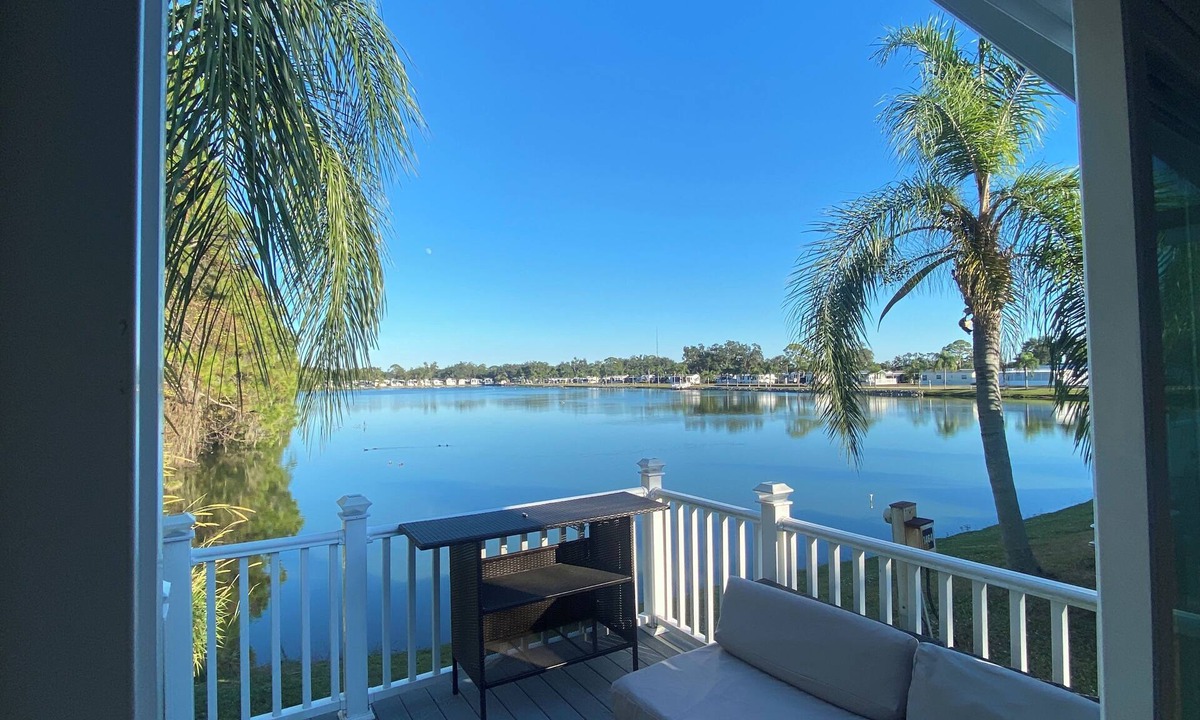 Braden River House | Updated Lakefront Home with Private Trail & Golf Cart
