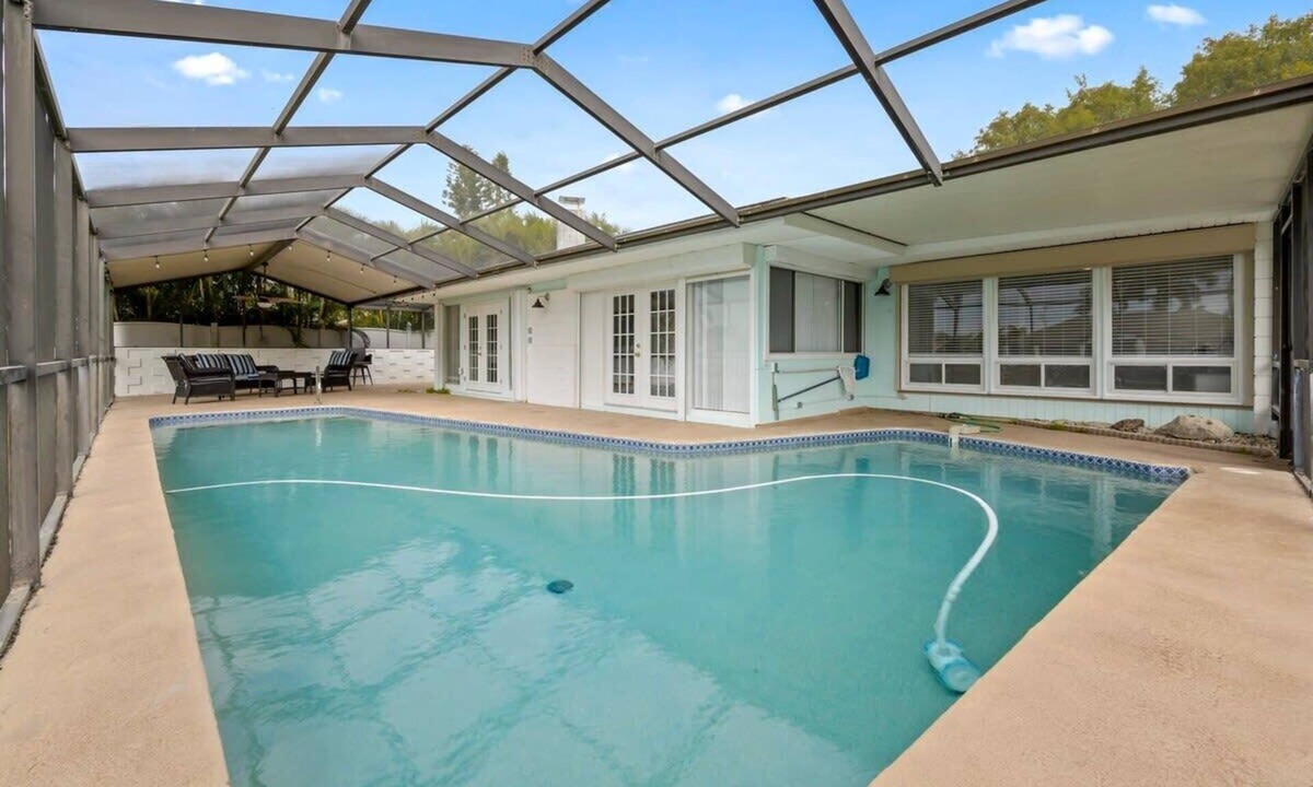 Cocoa Isles House | Updated Waterfront Pool Home with Putting Green