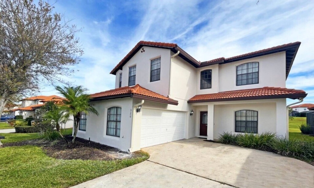 Four Corners House | Upgraded pool home with hot tub and games/movie room - gated resort 6 miles from Disney!