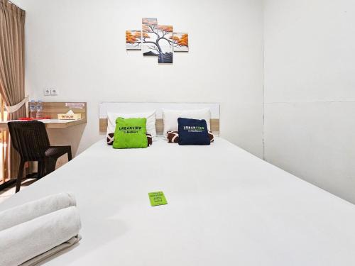 Dinoyo House | Urbanview Java Living Sigura Gura