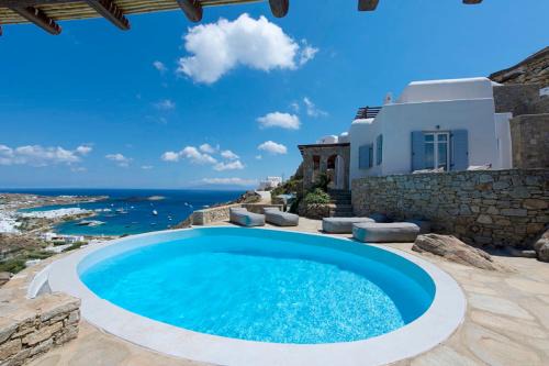 Psarou Villa | Villa Ammonite with heated pool by Diles Villas