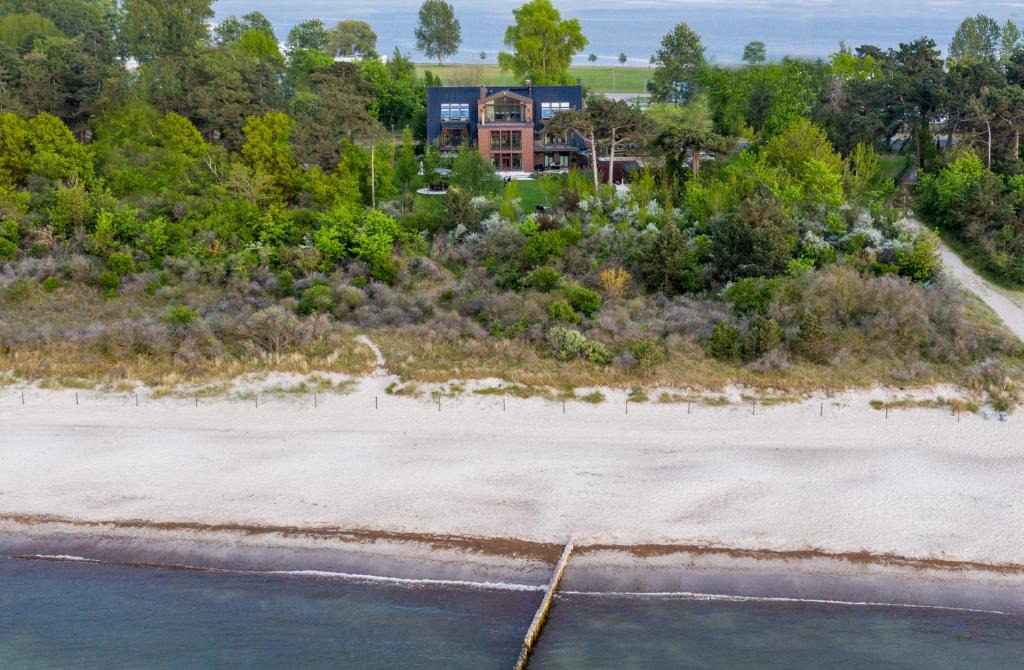 Hohe Dune Apartment | Villa Schmidt Apartments - Strandhaus direkt am Meer mit Sauna, Sport und Dünengarten - Komfort