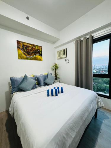 Phil-Am Apartment | Vinia Infinity Studio 1 Near Malls with WiFi and Netflix