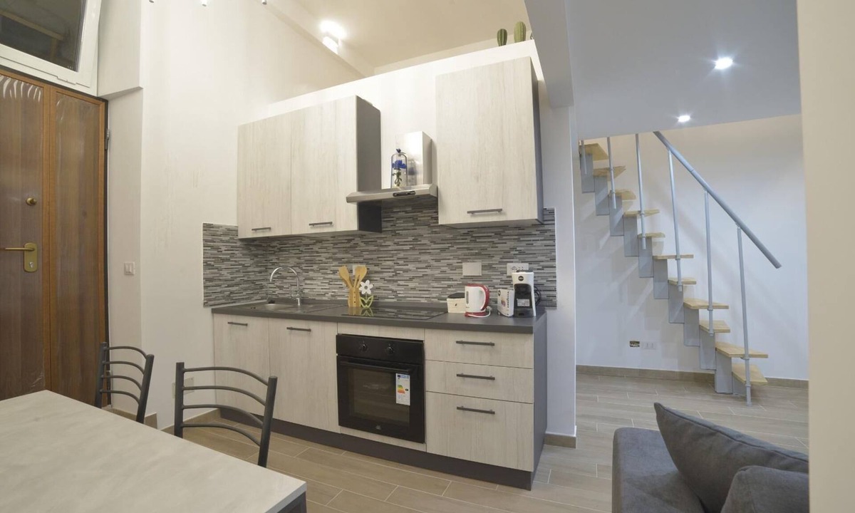 Quartiere XXIII Alessandrino Apartment | Vrbo Property
