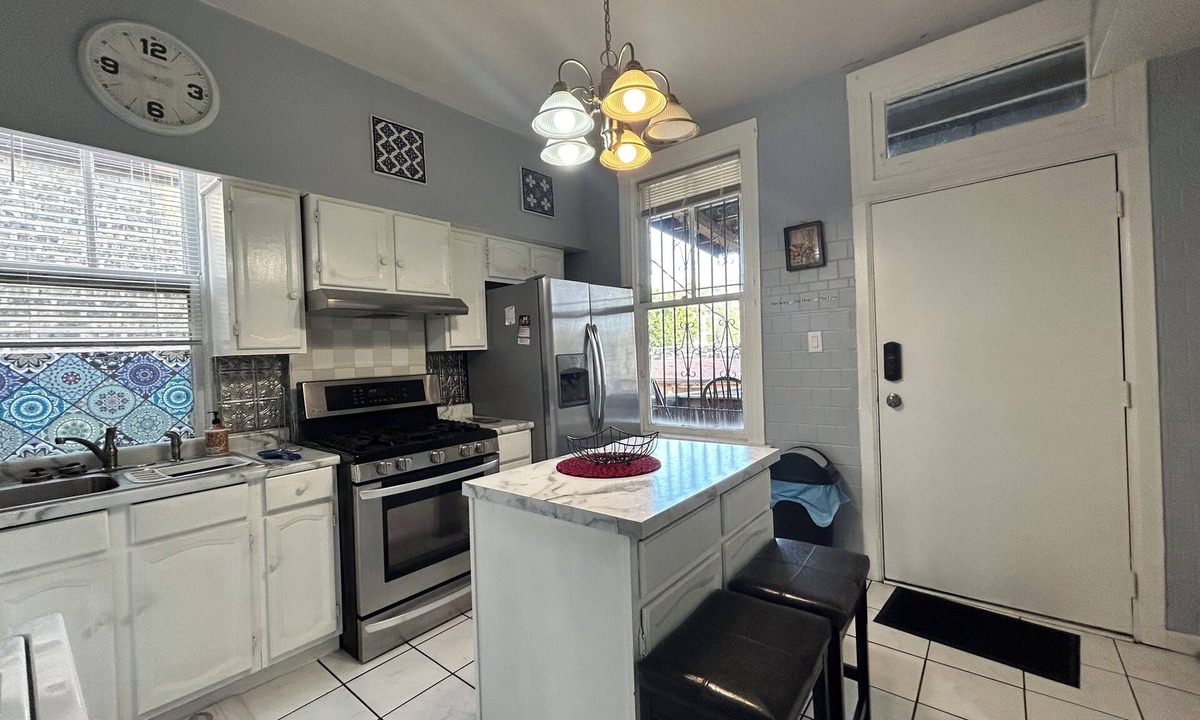 Logan Square House | Walkup Greystone steps to Logan Square restaurants, shopping bars and nightlife.