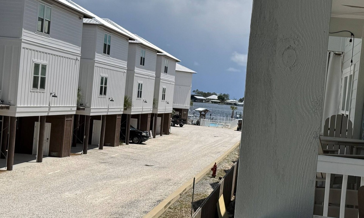 Orange Beach Condo | Waterfront Beautiful 3BR End-Unit in Walker Key— Balcony, Pools, and Boat slip