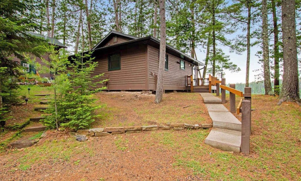 Sayner Condo | Waterfront cabin with Plum Lake views, private dock, beach access & kayaks