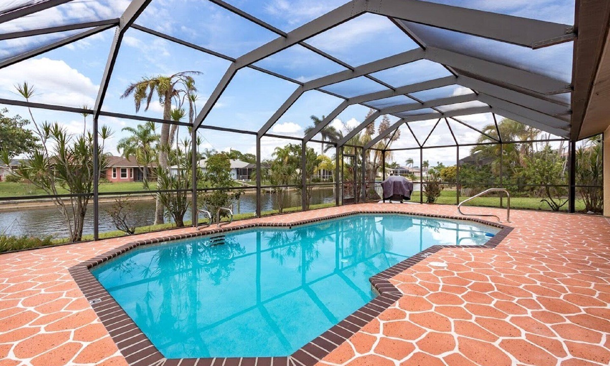 Fort Myers Villa | Waterfront Heated Pool Retreat with Dock Pet Friendly Sleeps 6 in Cape Coral